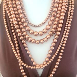 Cheeky's boutique 7 strand shiny copper beaded neclace